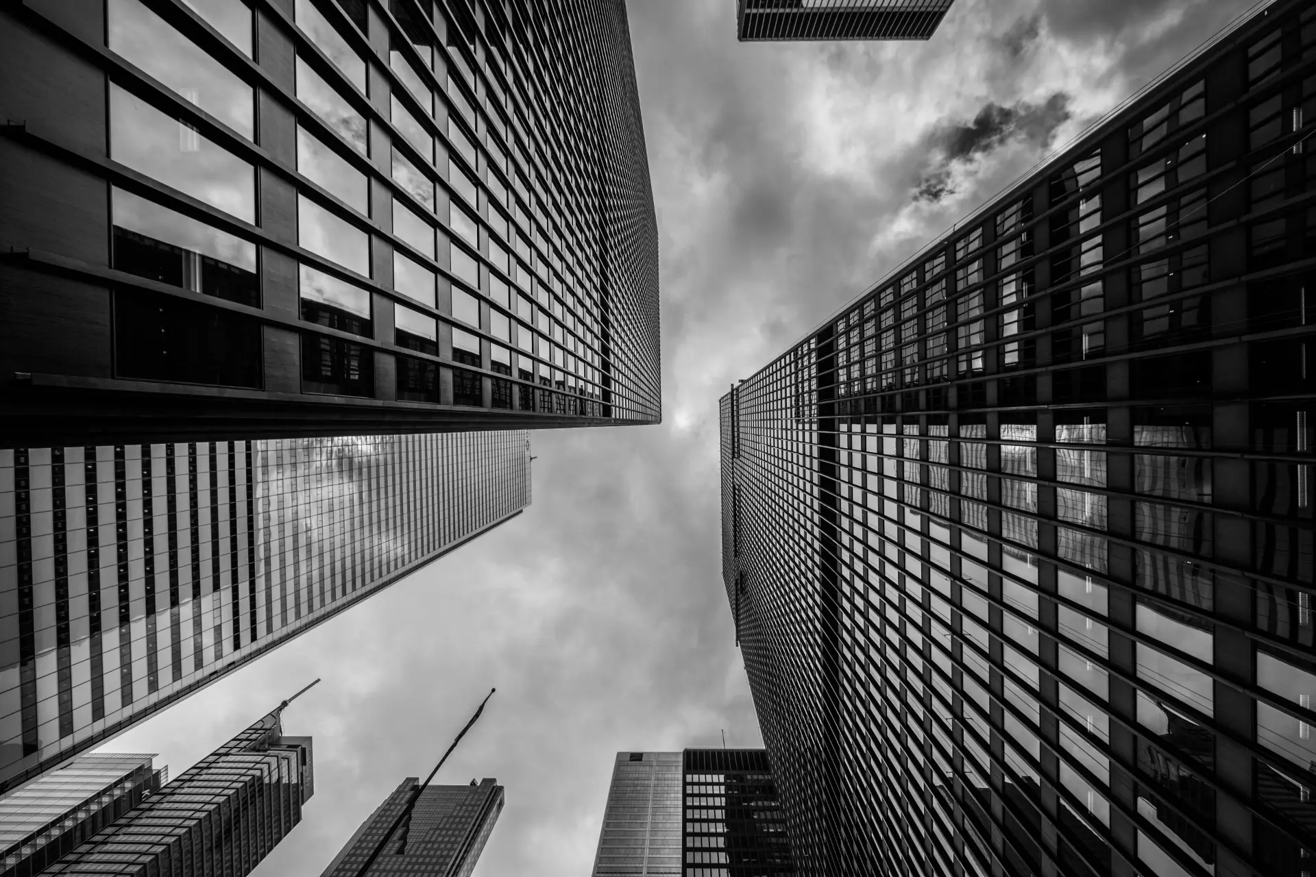 Looking up at glass skyscrapers